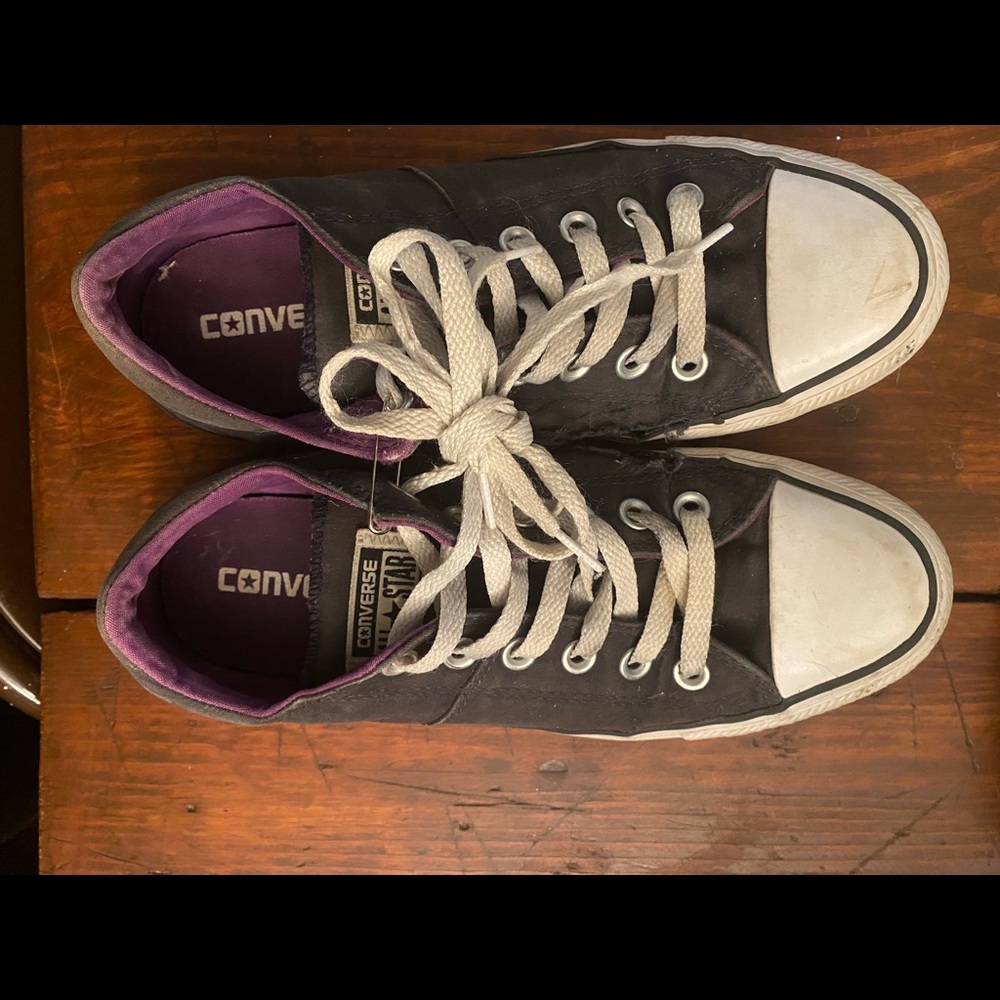 Black converse, size 8. Purple inside edging.
